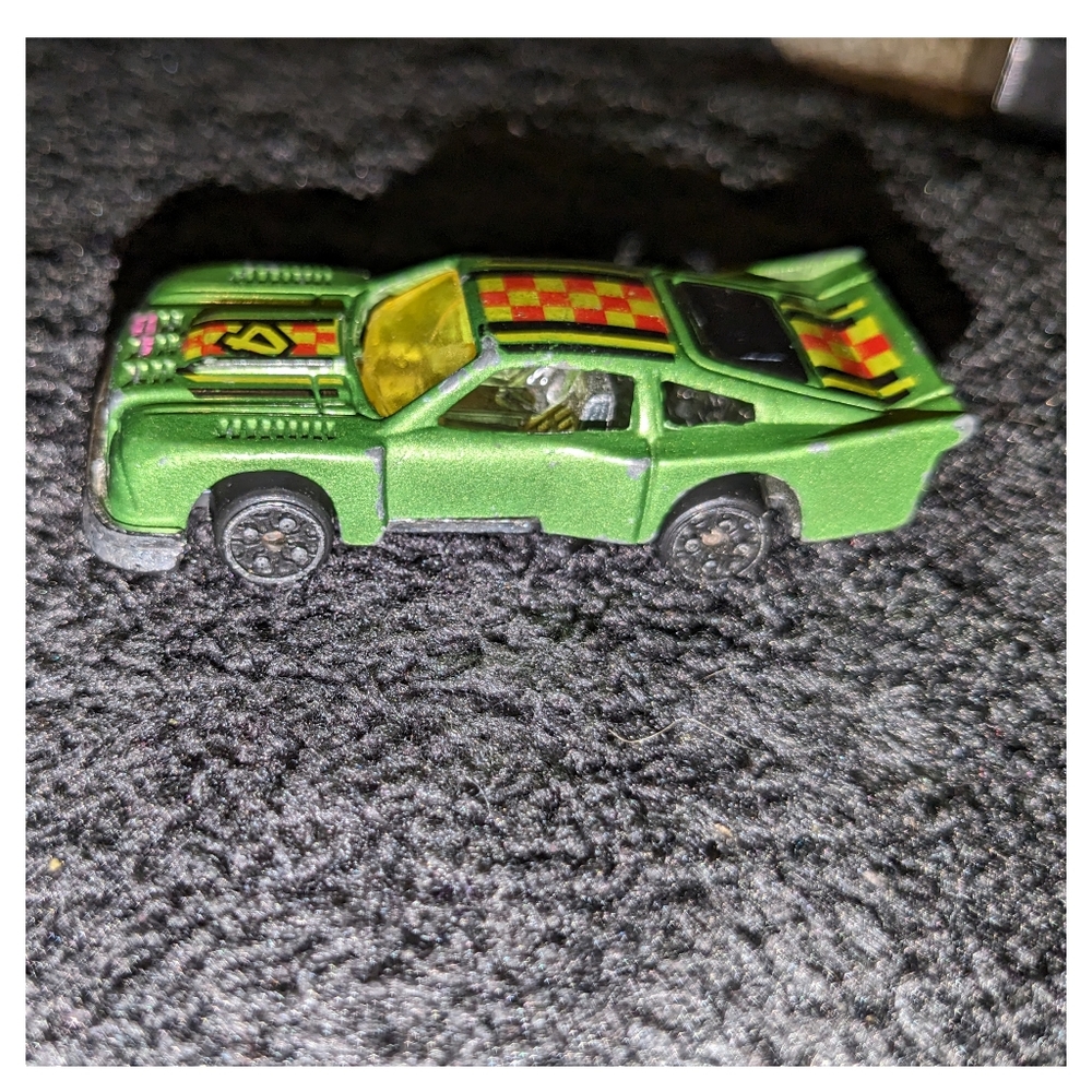 Vintage Ford Mustang Cobra II. Racing number 4. Scale is 1:64.